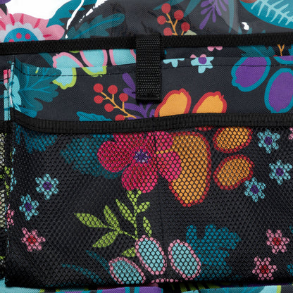 Floral patterned bag with colorful flowers on a black background