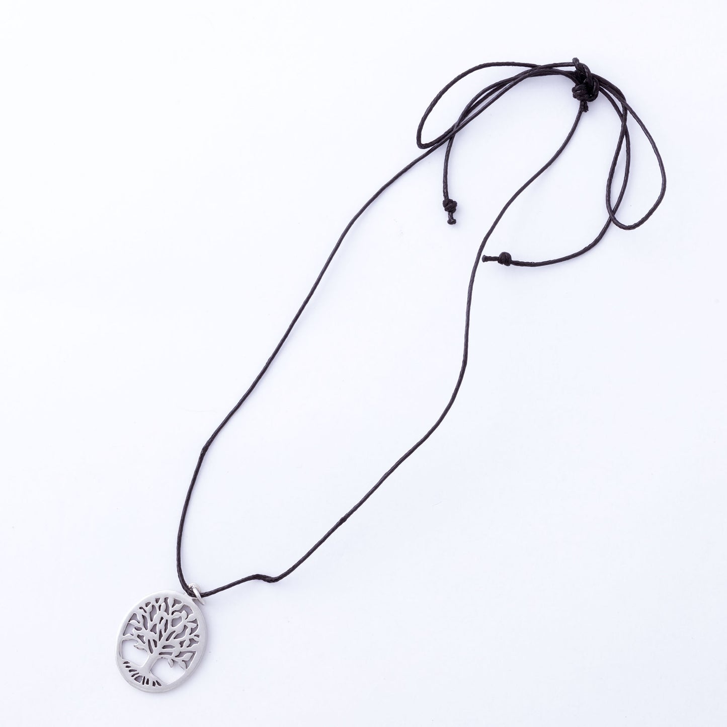 Necklace with a tree-of-life pendant on a white background