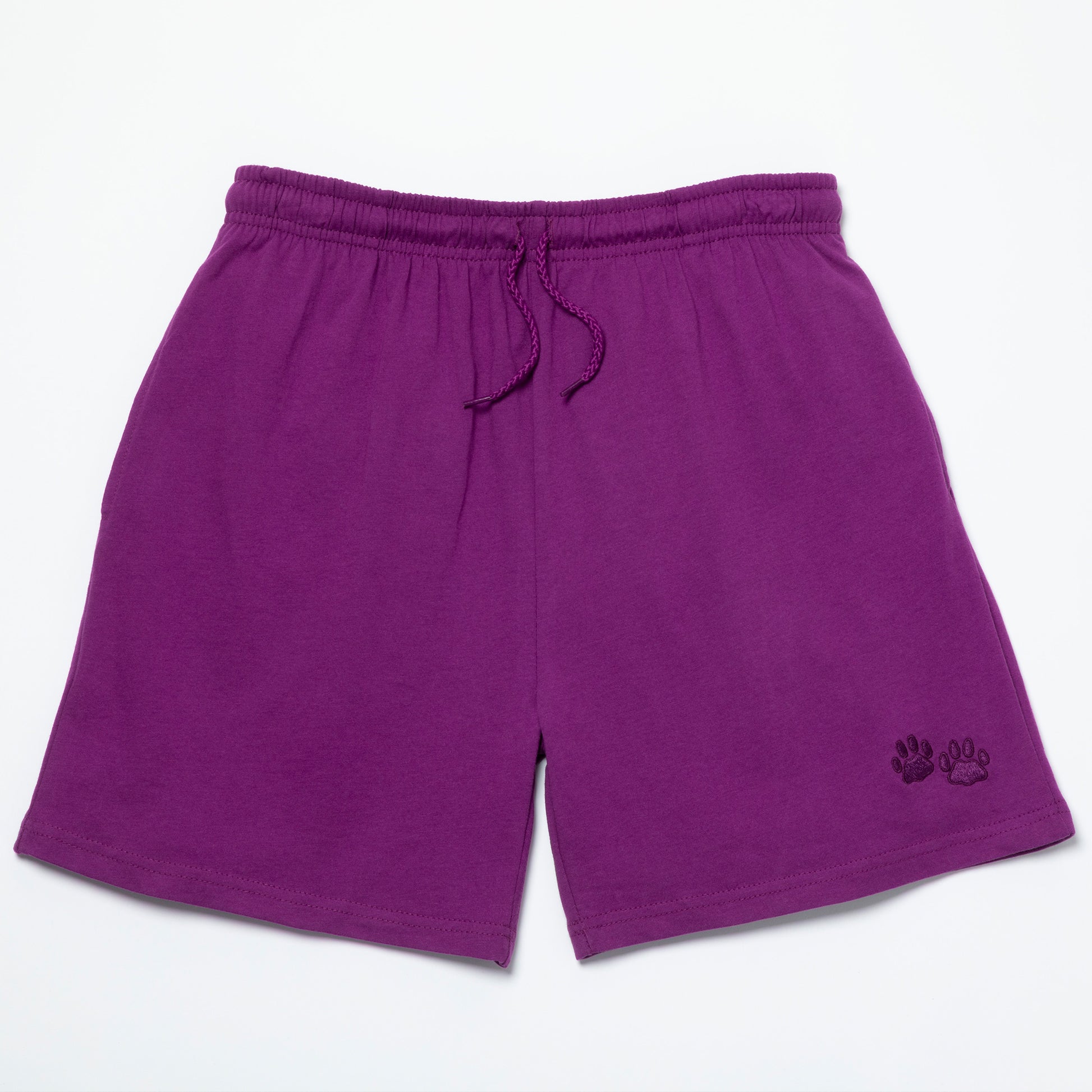 Purple shorts with a small logo on a light gray background