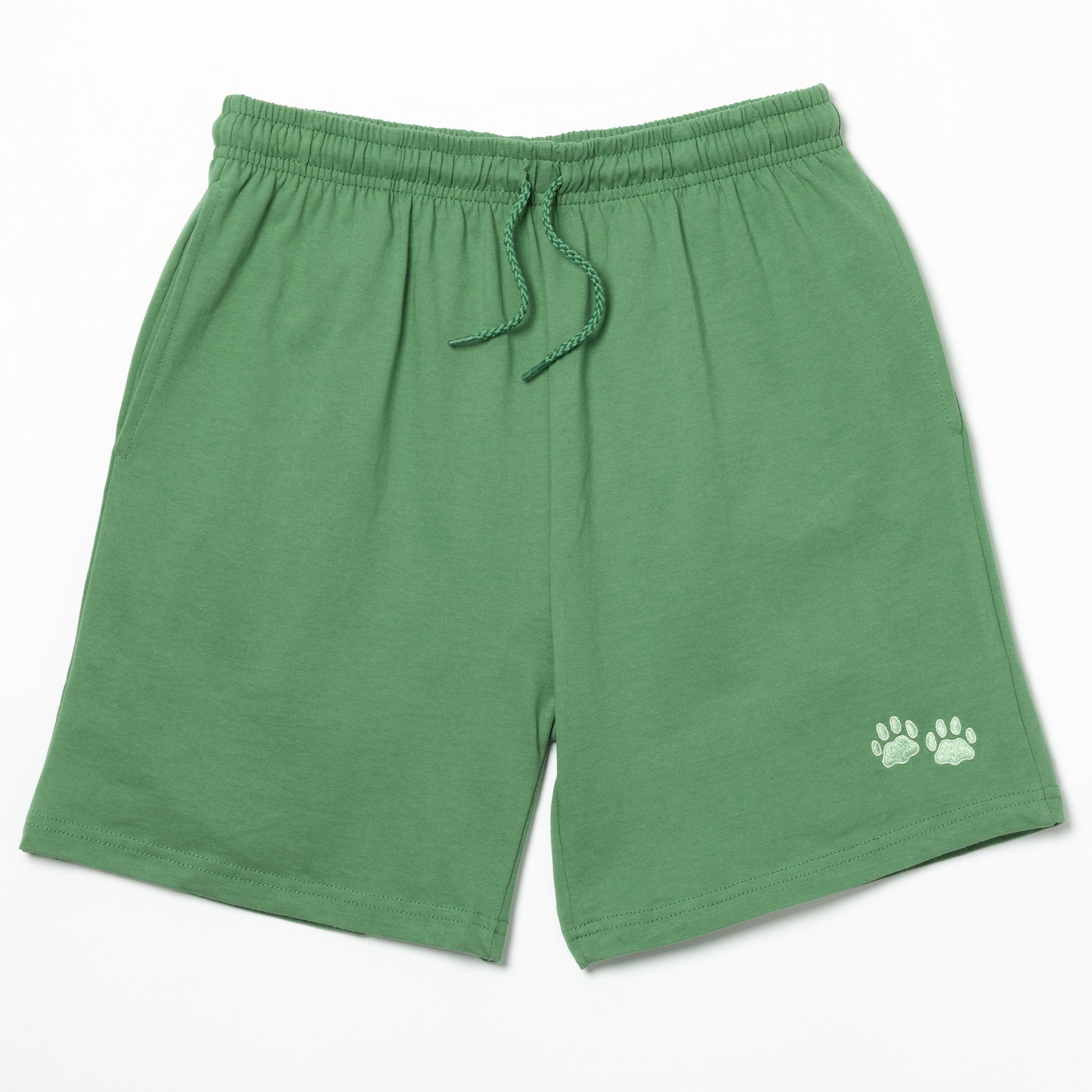 Green shorts with two light green embroidered paw prints on the left leg on a white background