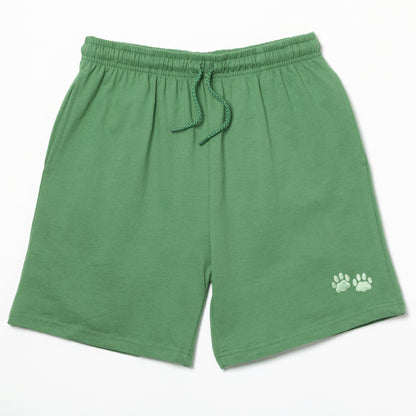 Green shorts with two light green embroidered paw prints on the left leg on a white background