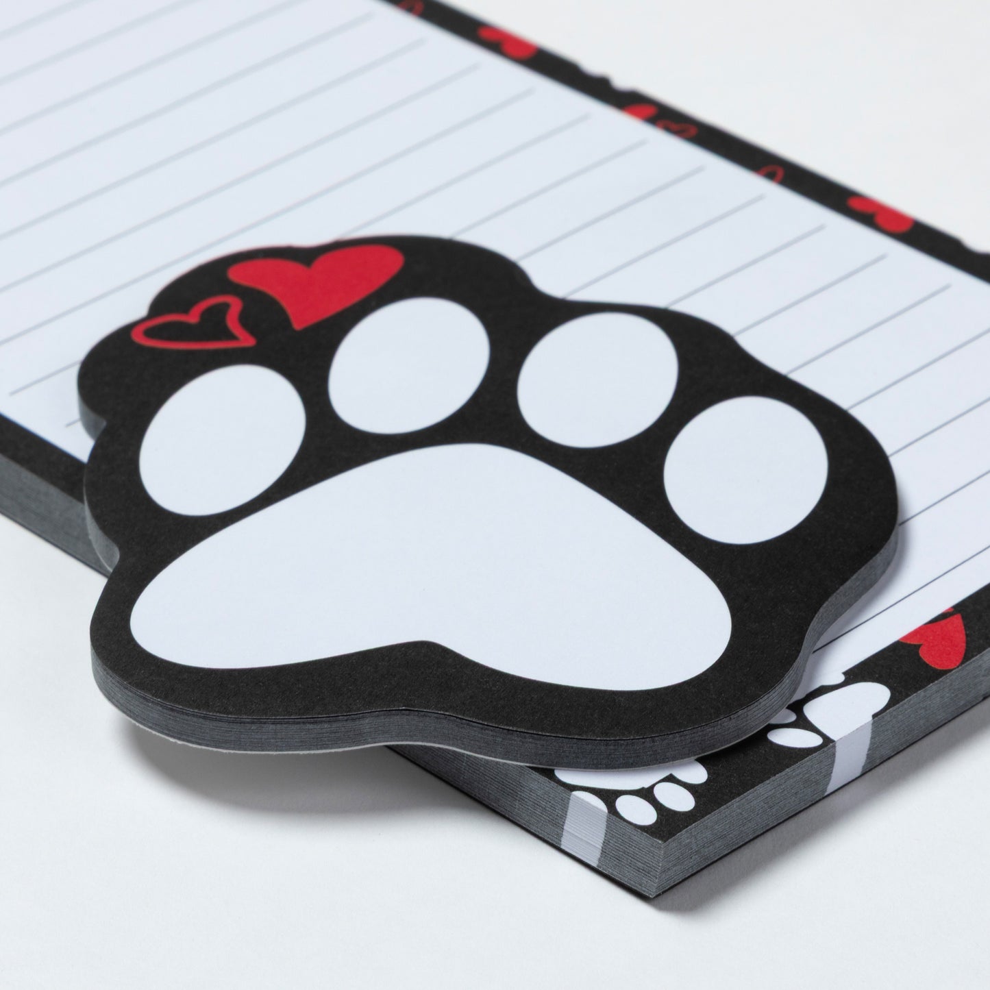 Notepad with a paw print design on a white background