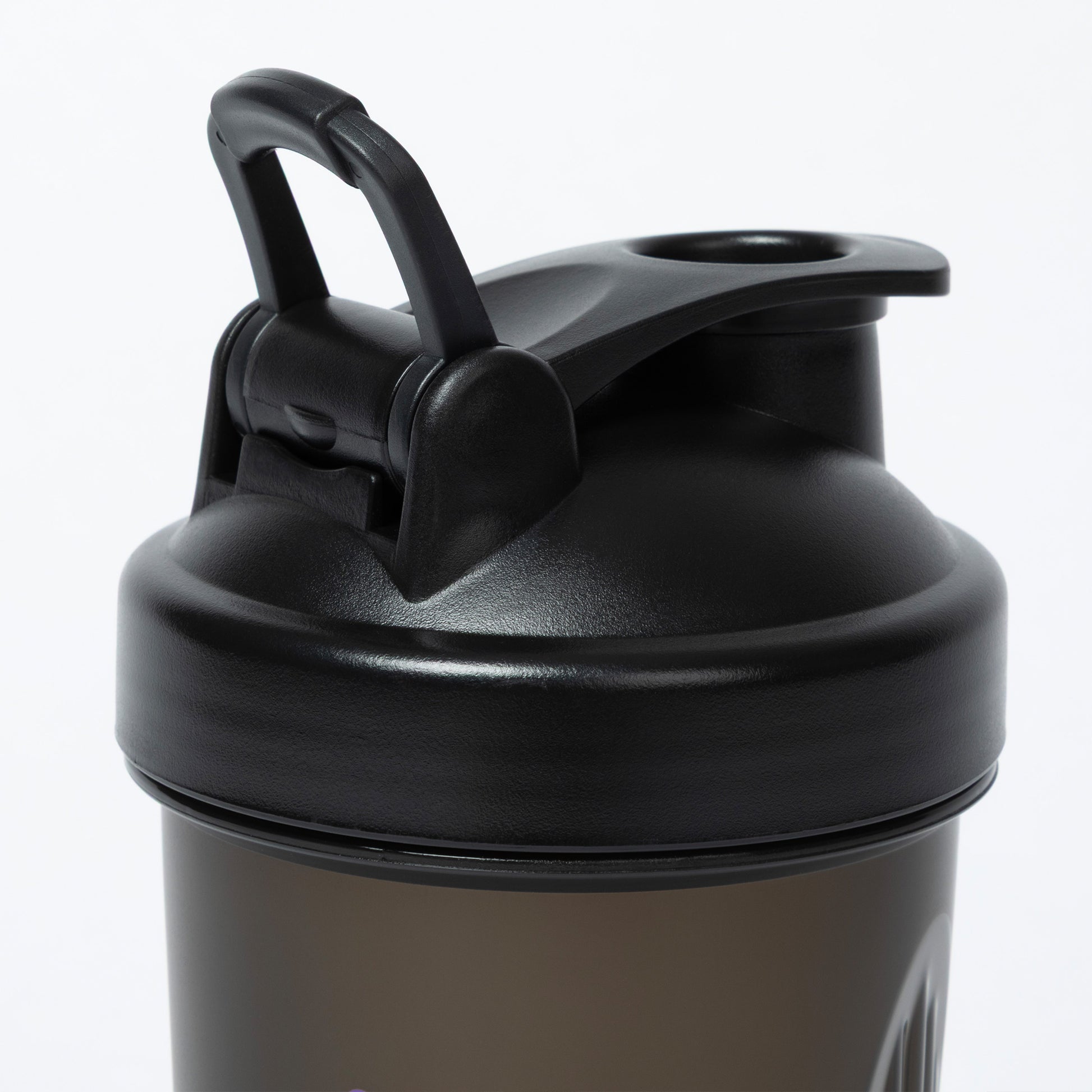 Black shaker bottle with a handle on a white background