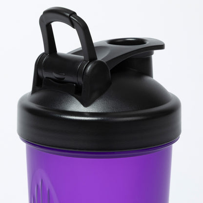 Purple shaker bottle with black lid on a white background