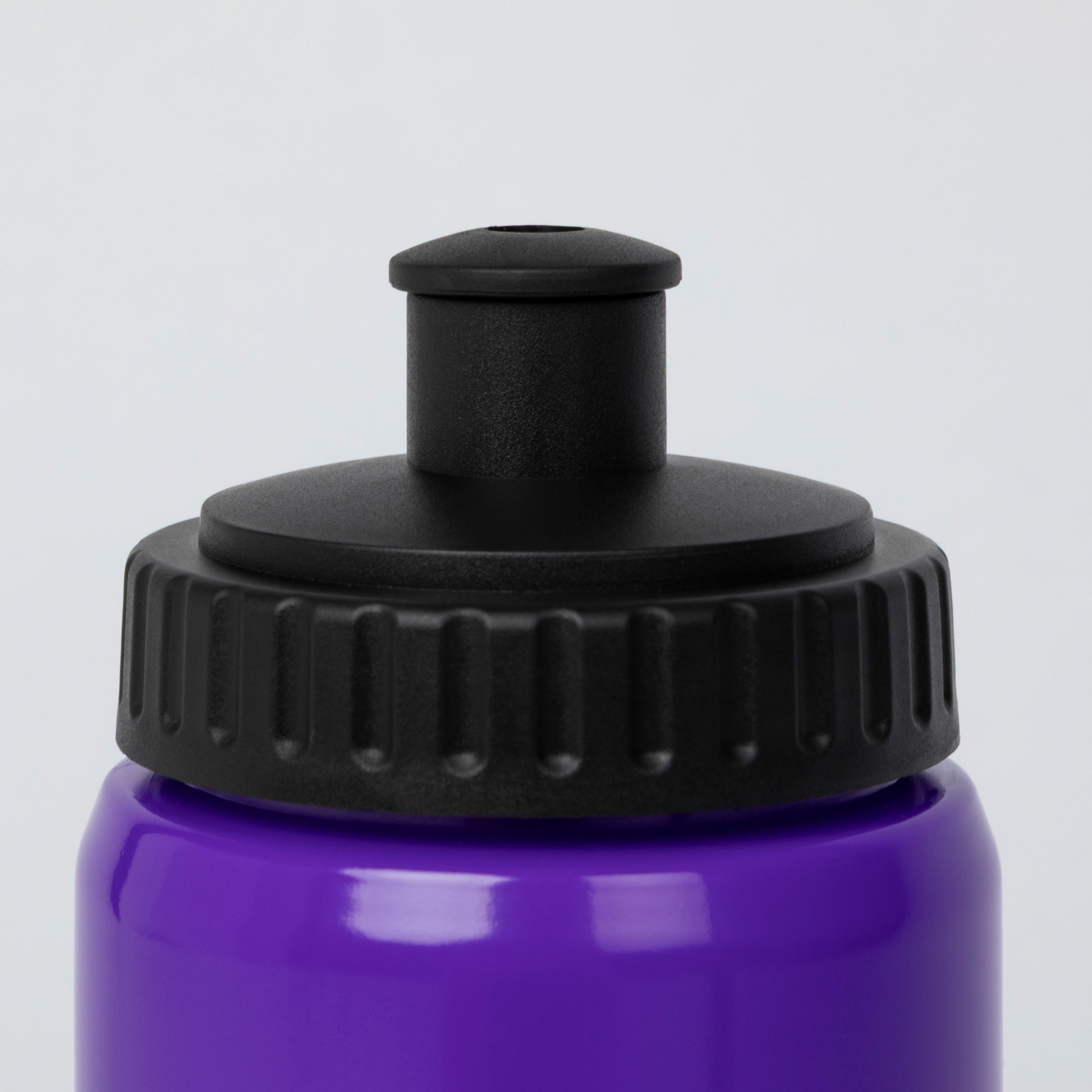 Close-up of a purple water bottle with a black screw-on cap and a black straw-style top insert, shown against a light gray background.