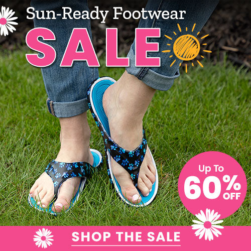 Sun-Ready Footwear Sale promotion from The Animal Rescue Site and GreaterGood. Proceeds help support shelter pets and more. Black paw print flip flops, blue trim sandals, casual summer footwear.