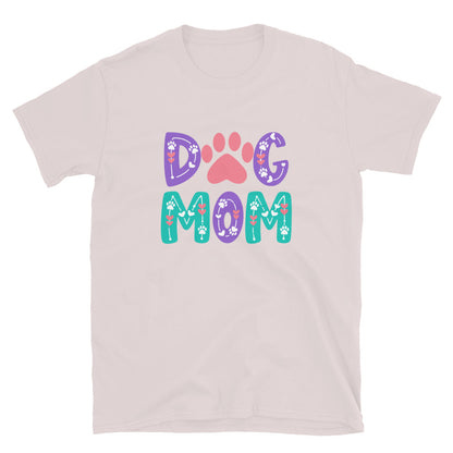 T-shirt with 'DOG MOM' text and paw prints on a light pink background