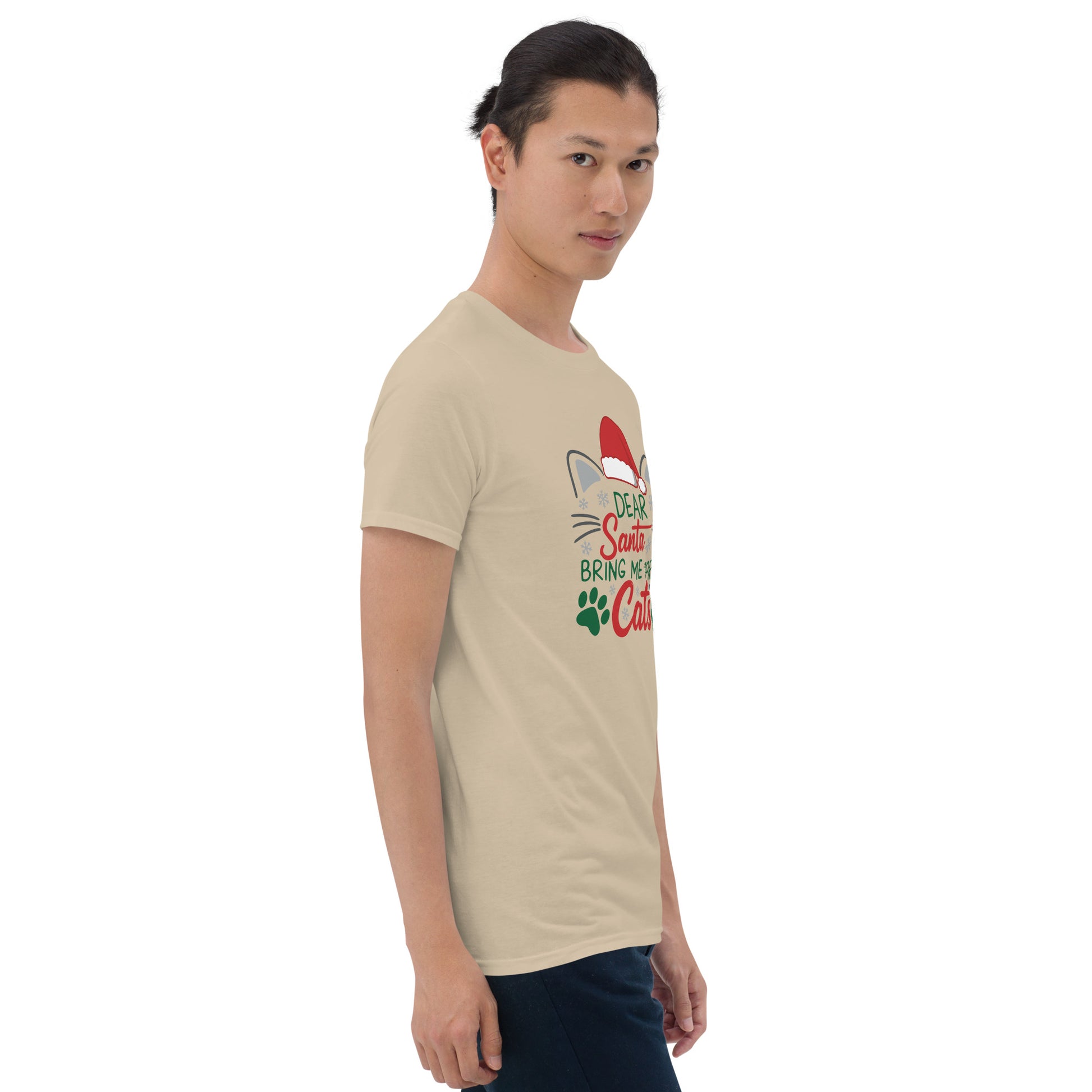 man wearing a tan Short Sleeve Shirt that reads Dear Santa Bring Me More Cats. Featuring a santa hat, cat ears and cat whiskers with paw prints
