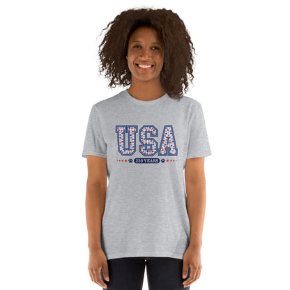 Person wearing a gray t-shirt with red text on a white background