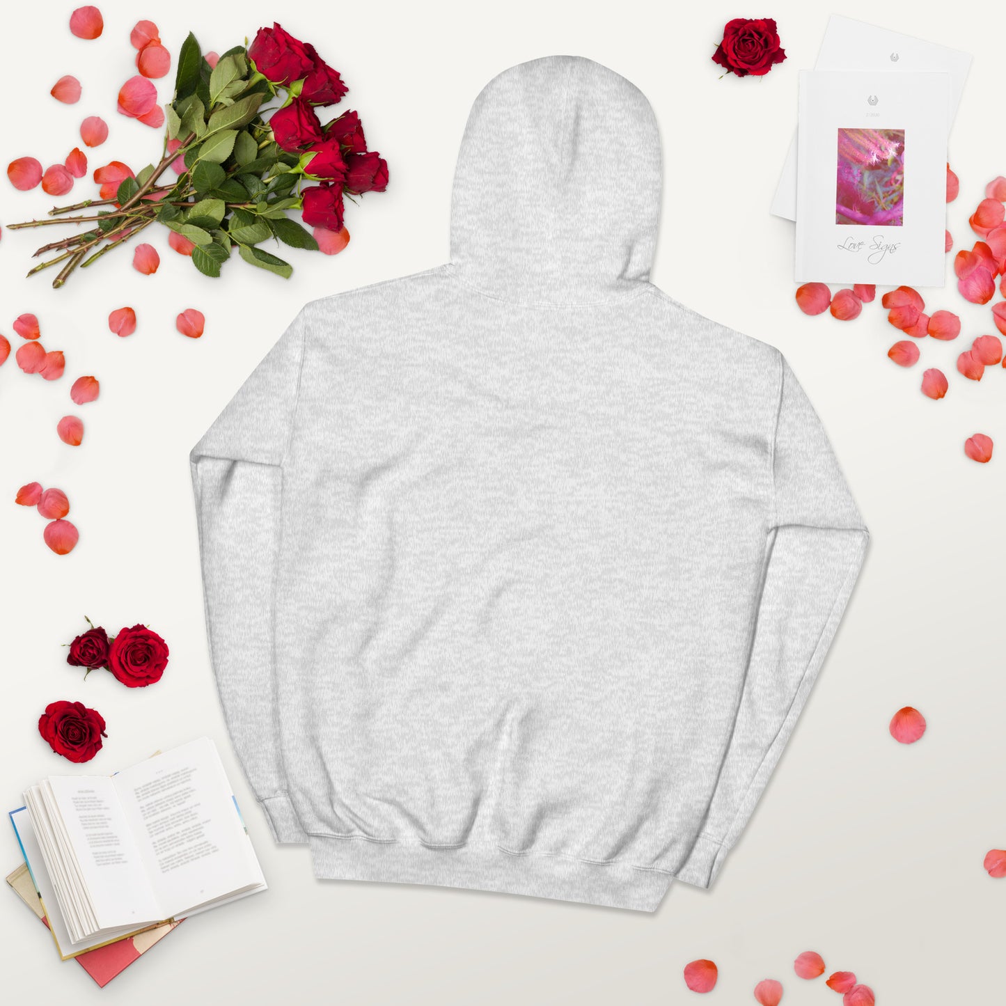 Back of a light gray hoodie with a valentines background
