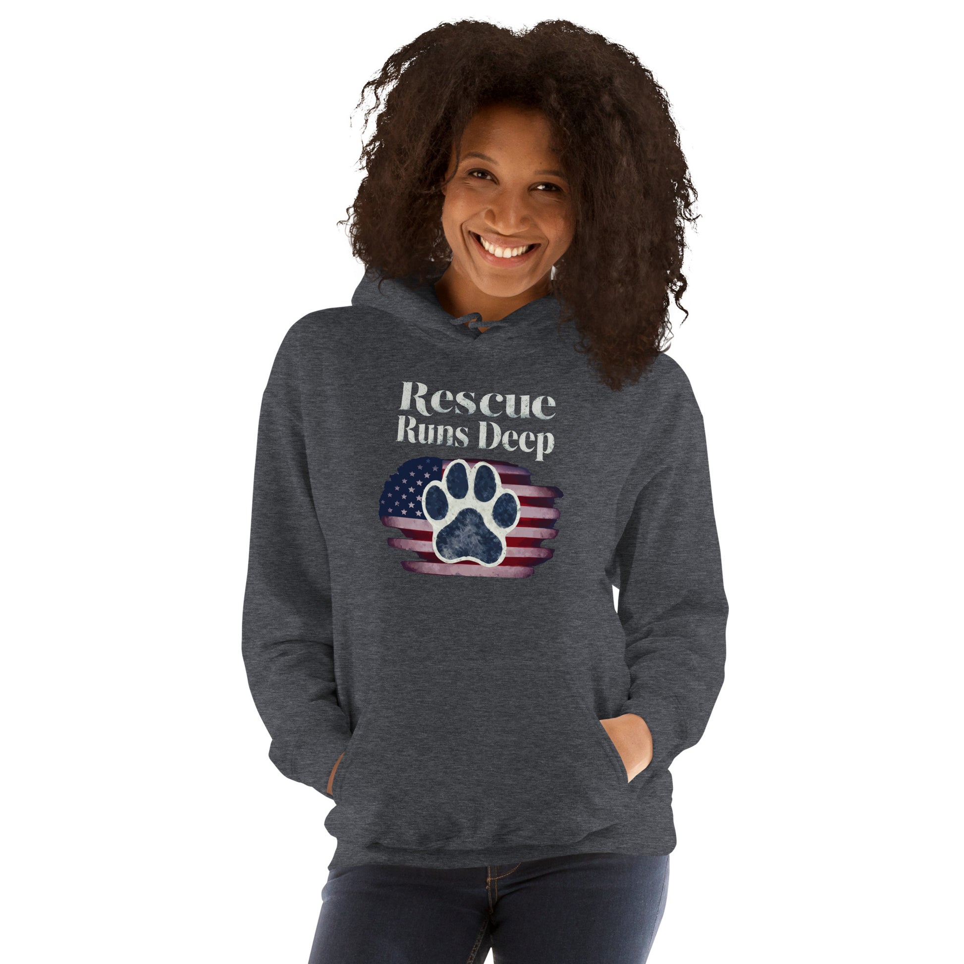 Female model wearing gray hoodie that features a paw print design with American Flag that says " Rescue Runs Deep"