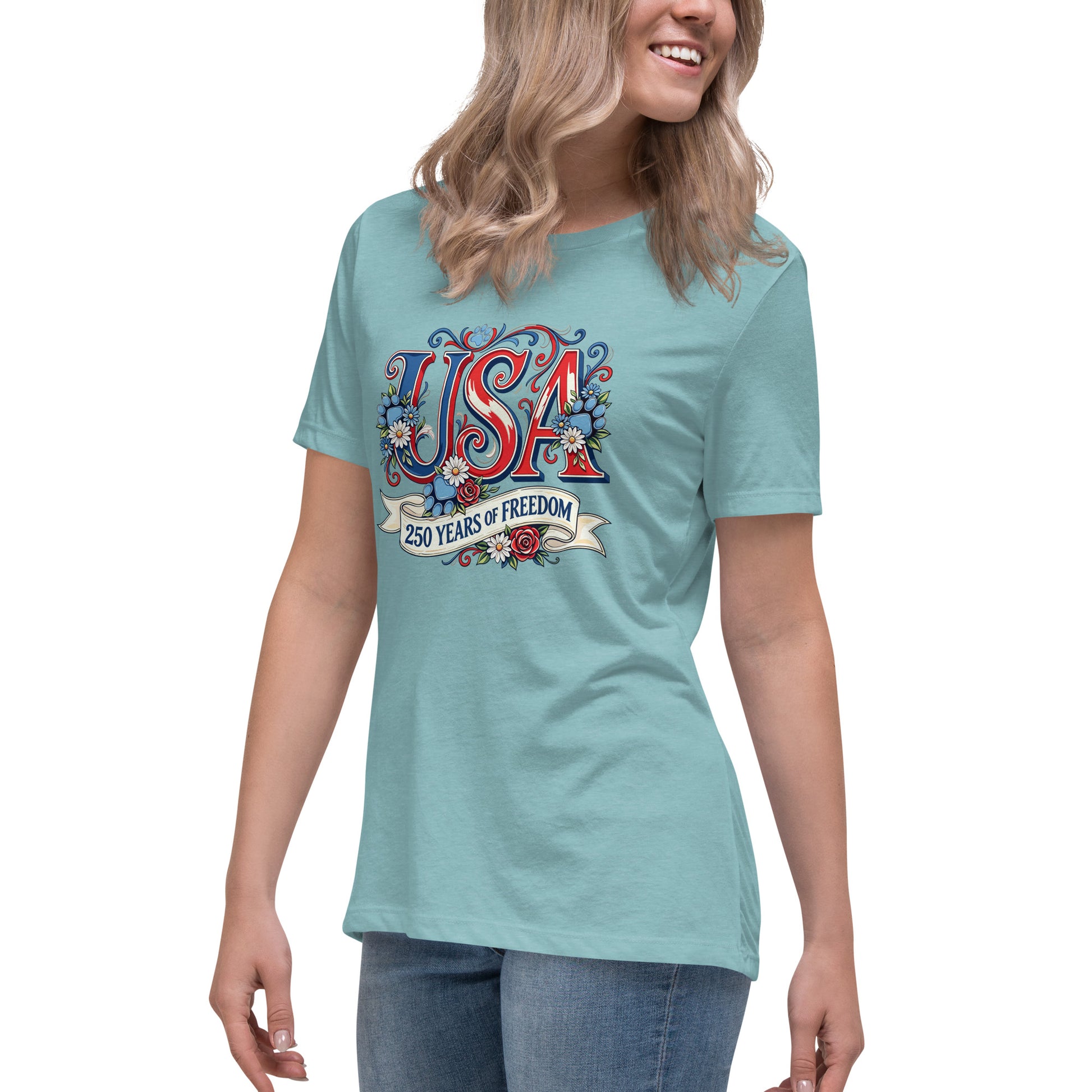 Person wearing a light blue t-shirt with 'USA 250 Years of Freedom' design on a white background