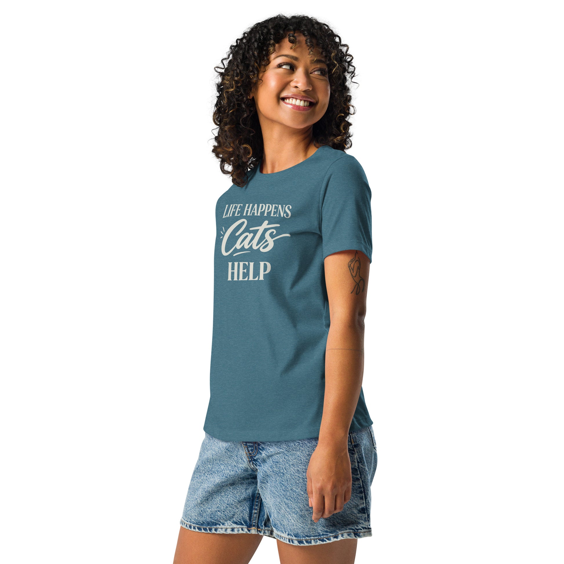 Woman wearing a blue t-shirt with a graphic design on a white background