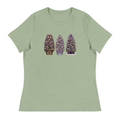 A sage green short-sleeve crewneck t-shirt featuring a graphic print of three decorated Christmas trees in the center chest area, shown against a plain white background.