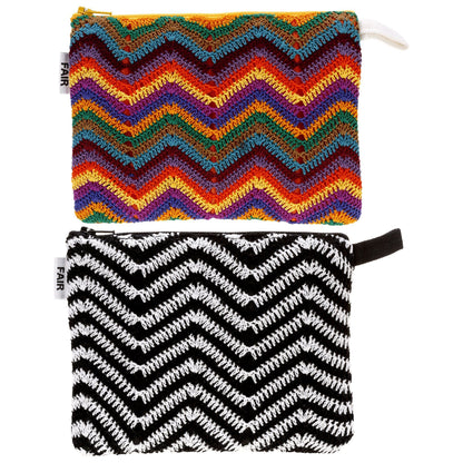 Two chevron-patterned pouches, one multicolored and one black and white, on a white background.