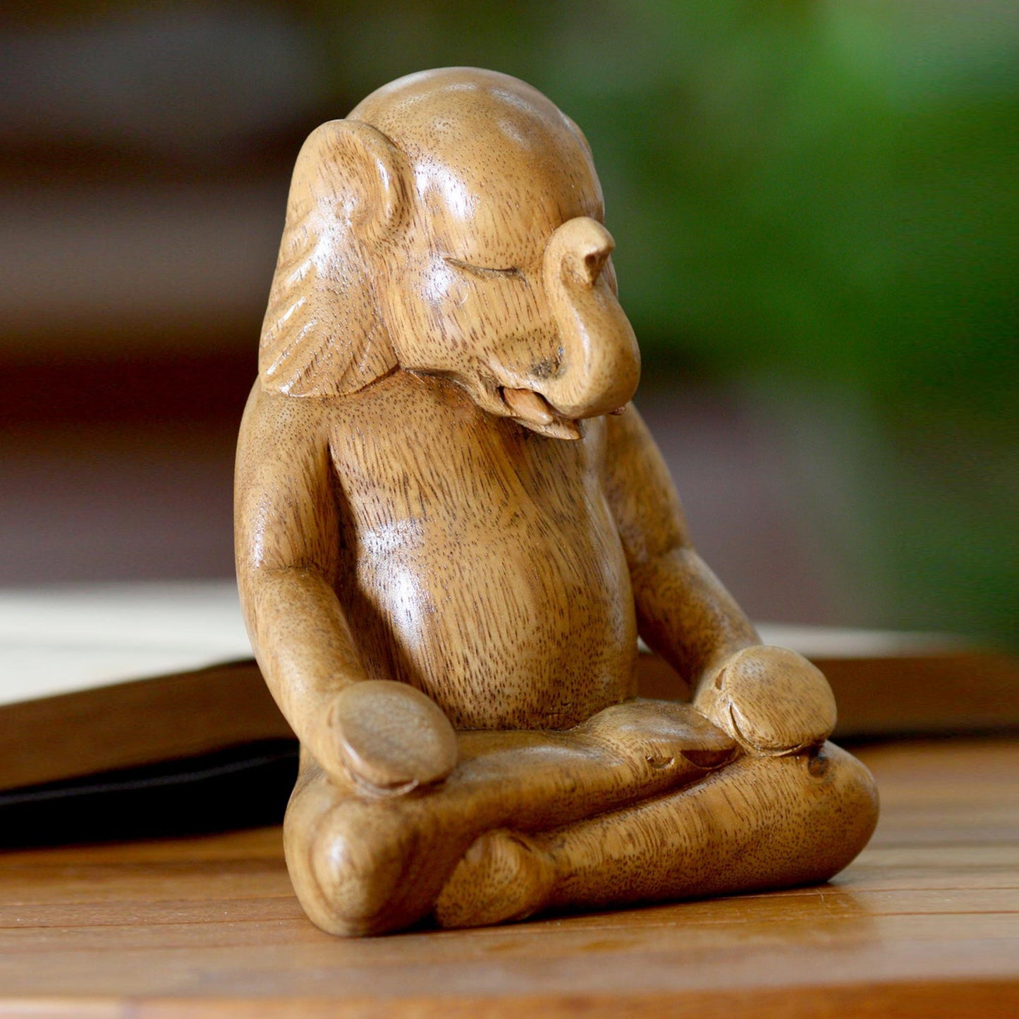 Elephant Meditates Wood Sculpture