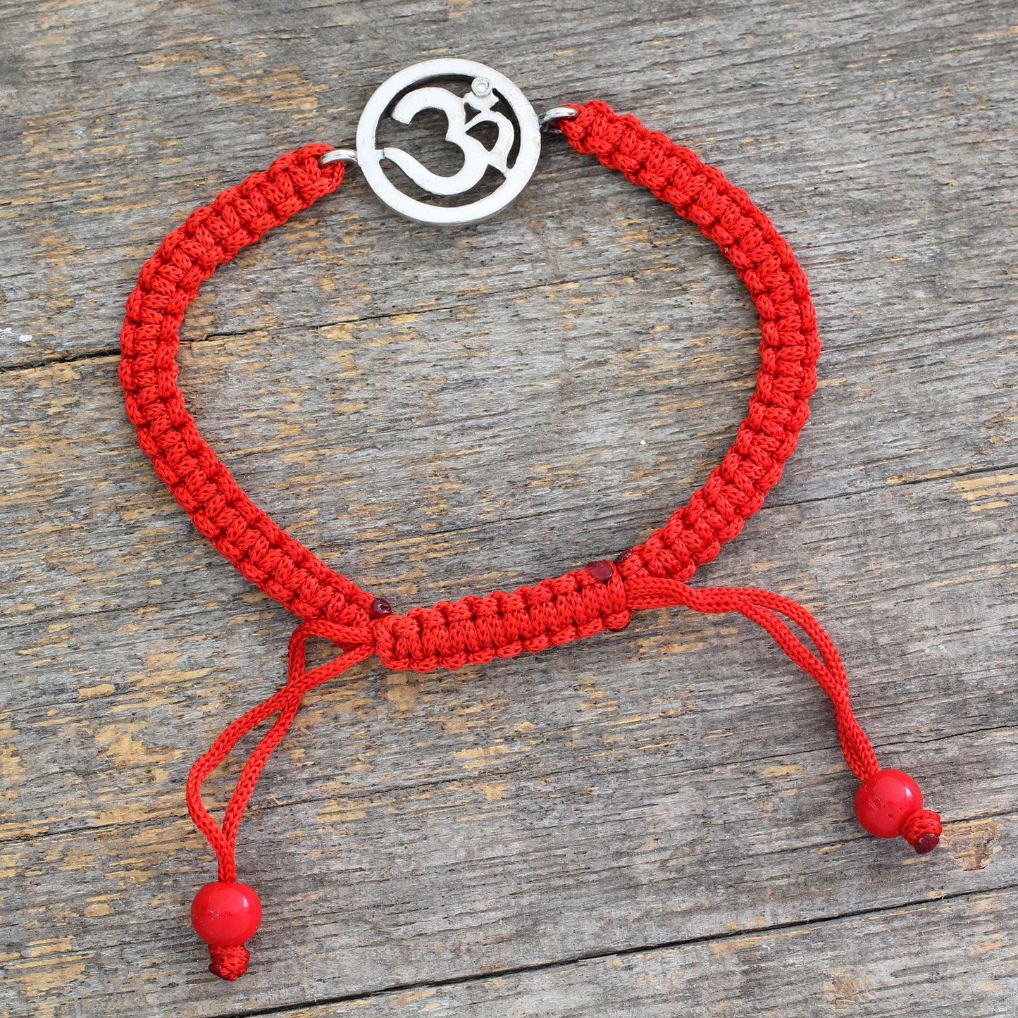 Solitary Crimson Om Diamond charm bracelet