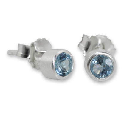 Light Sterling Silver Stud Earrings with Faceted Blue Topaz