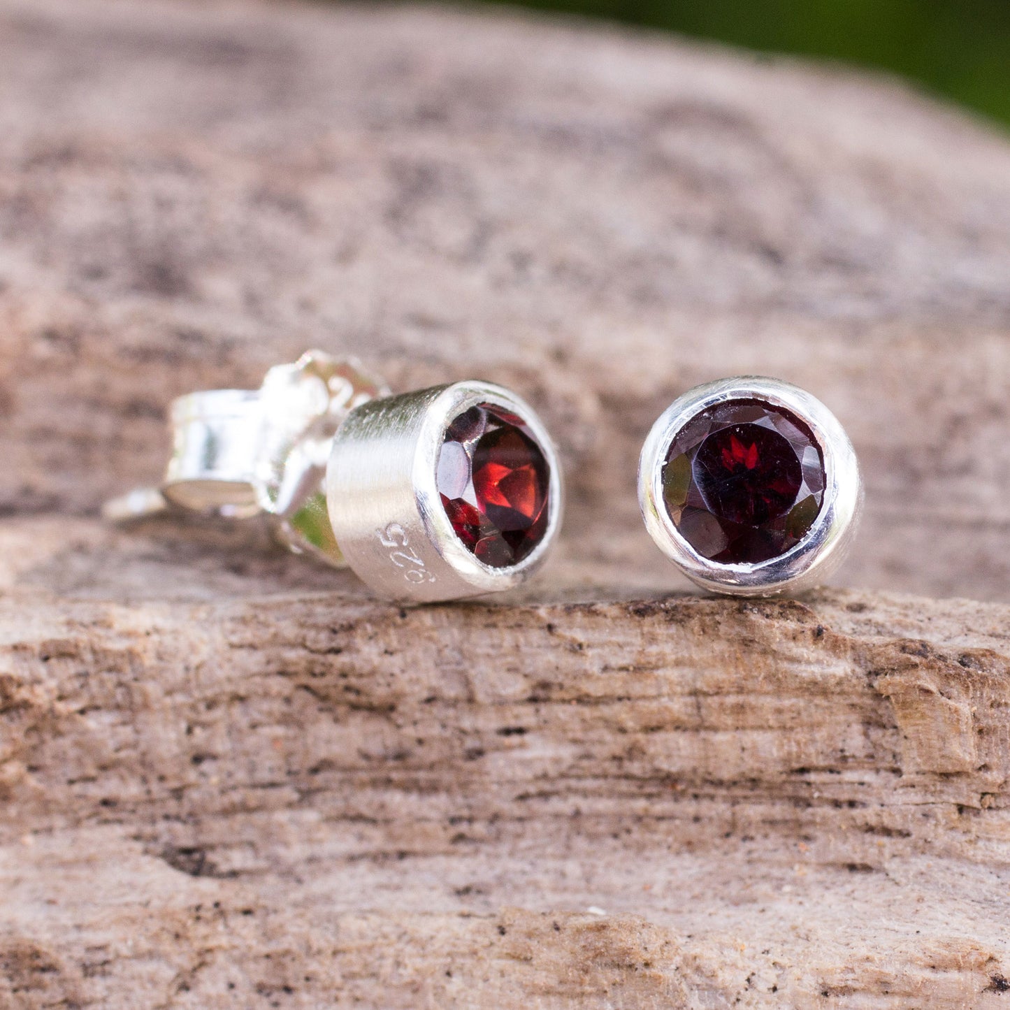 Light Sterling Silver Stud Earrings with Faceted Garnet