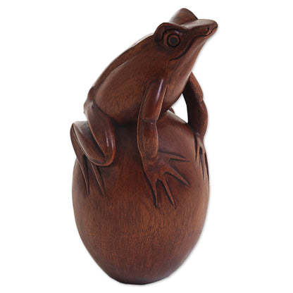 Proud Frog Hand Carved Suar Wood Frog on Pebble Sculpture