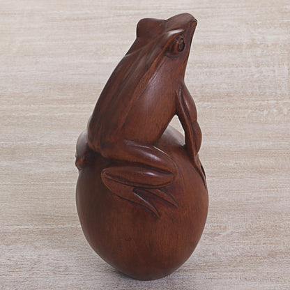 Proud Frog Hand Carved Suar Wood Frog on Pebble Sculpture