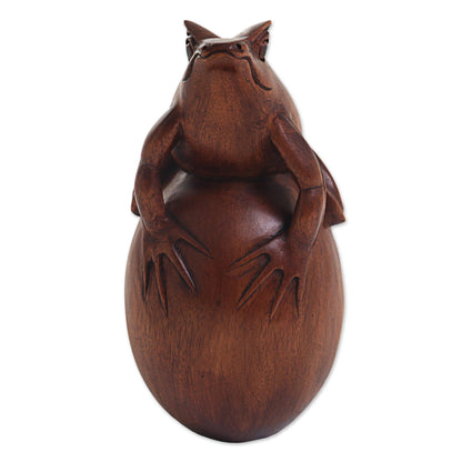 Proud Frog Hand Carved Suar Wood Frog on Pebble Sculpture