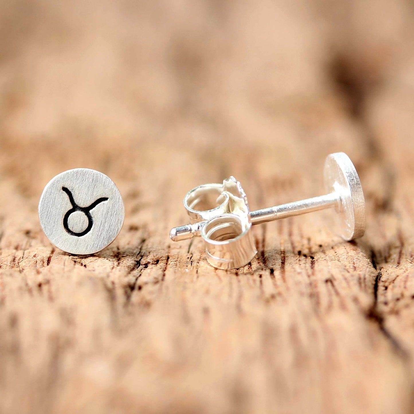 Satin Taurus Sterling Silver Taurus Stud Earrings from Thailand