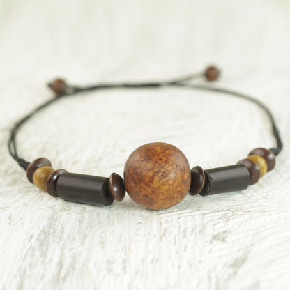 Round Might Sese Wood and Bamboo Cord Pendant Necklace from Ghana