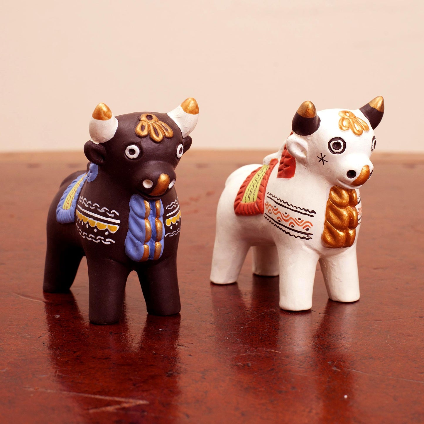 Little Bulls of Pucara Ornate Brown and White Andean Bull Figurines (Pair)