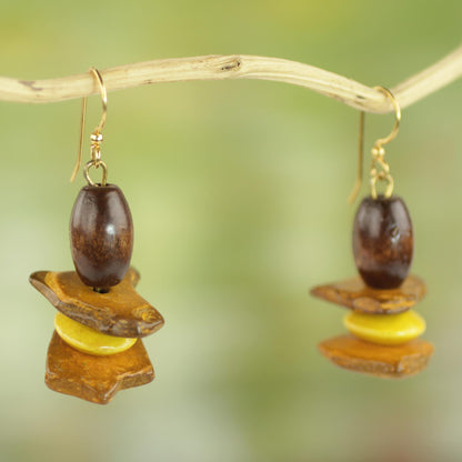 Yellow Prosperity Sese Wood and Coconut Shell Dangle Earrings from Ghana