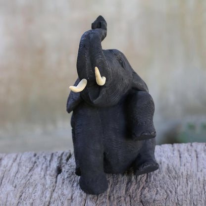 Joyous Elephant Black Teakwood Wood Sculpture
