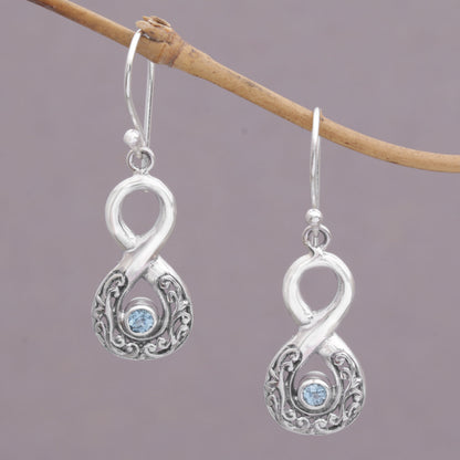 Blue Tangle Blue Topaz and Sterling Silver Looping Earrings from Bali