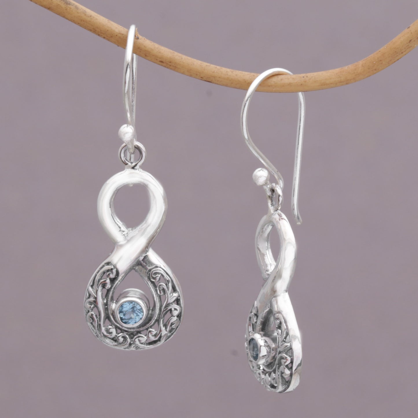 Blue Tangle Blue Topaz and Sterling Silver Looping Earrings from Bali