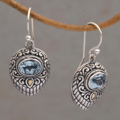 Swirling Crests Gold Accent Blue Topaz and 925 Silver Earrings from Bali