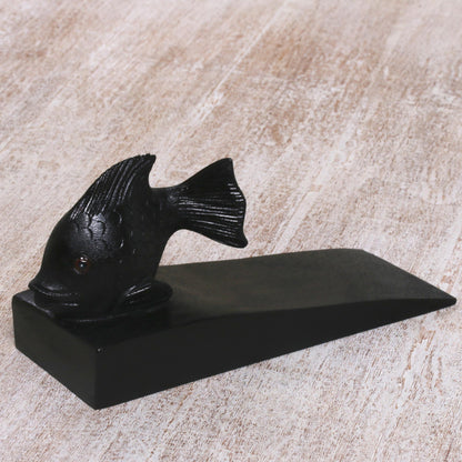 Helpful Goldfish in Black Handcrafted Suar Wood Fish Doorstop in Black from Bali