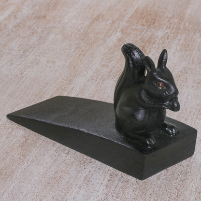 Helpful Squirrel in Black Handcrafted Wood Squirrel Doorstop in Black from Bali