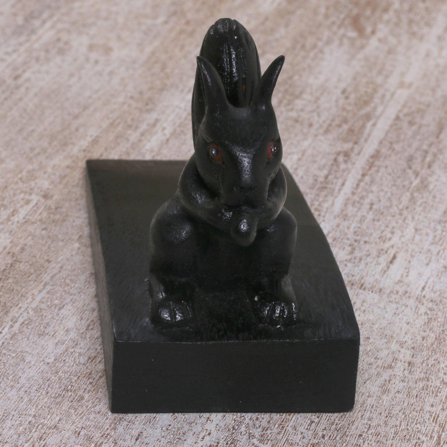 Helpful Squirrel in Black Handcrafted Wood Squirrel Doorstop in Black from Bali