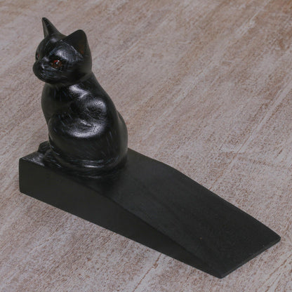 Helpful Kitten In Black Wood Doorstop