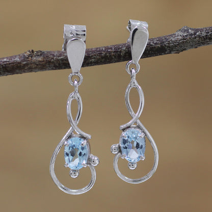 Beauty Swirls Rhodium Plated Blue Topaz Dangle Earrings from India