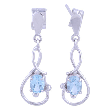 Beauty Swirls Rhodium Plated Blue Topaz Dangle Earrings from India