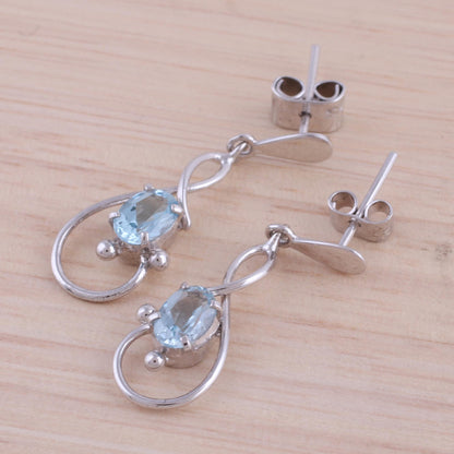 Beauty Swirls Rhodium Plated Blue Topaz Dangle Earrings from India