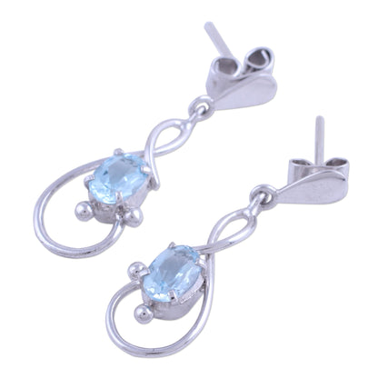 Beauty Swirls Rhodium Plated Blue Topaz Dangle Earrings from India