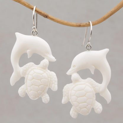 Friends Among the Waves Bone Dangle Earrings with Dolphin and Tortoise Theme