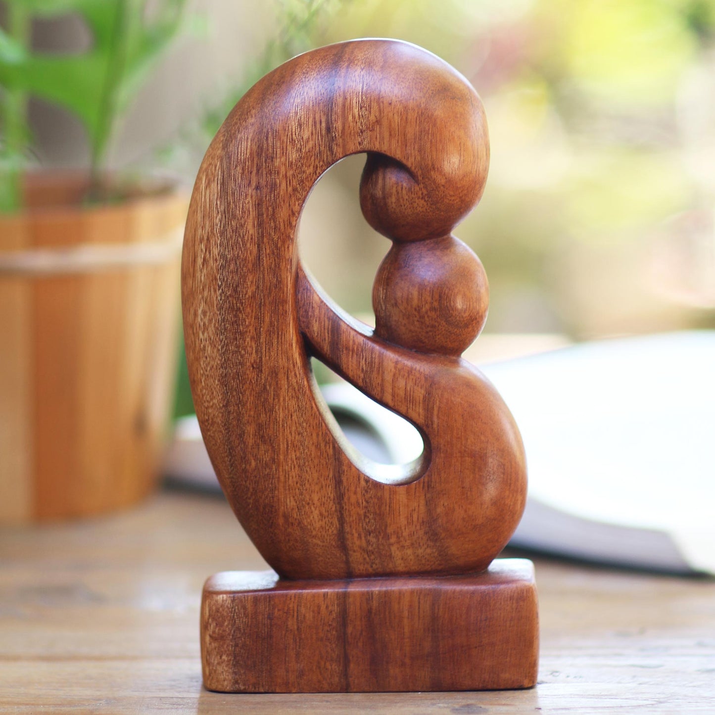 Maternal Embrace Curved Hand Carved Wood Sculpture