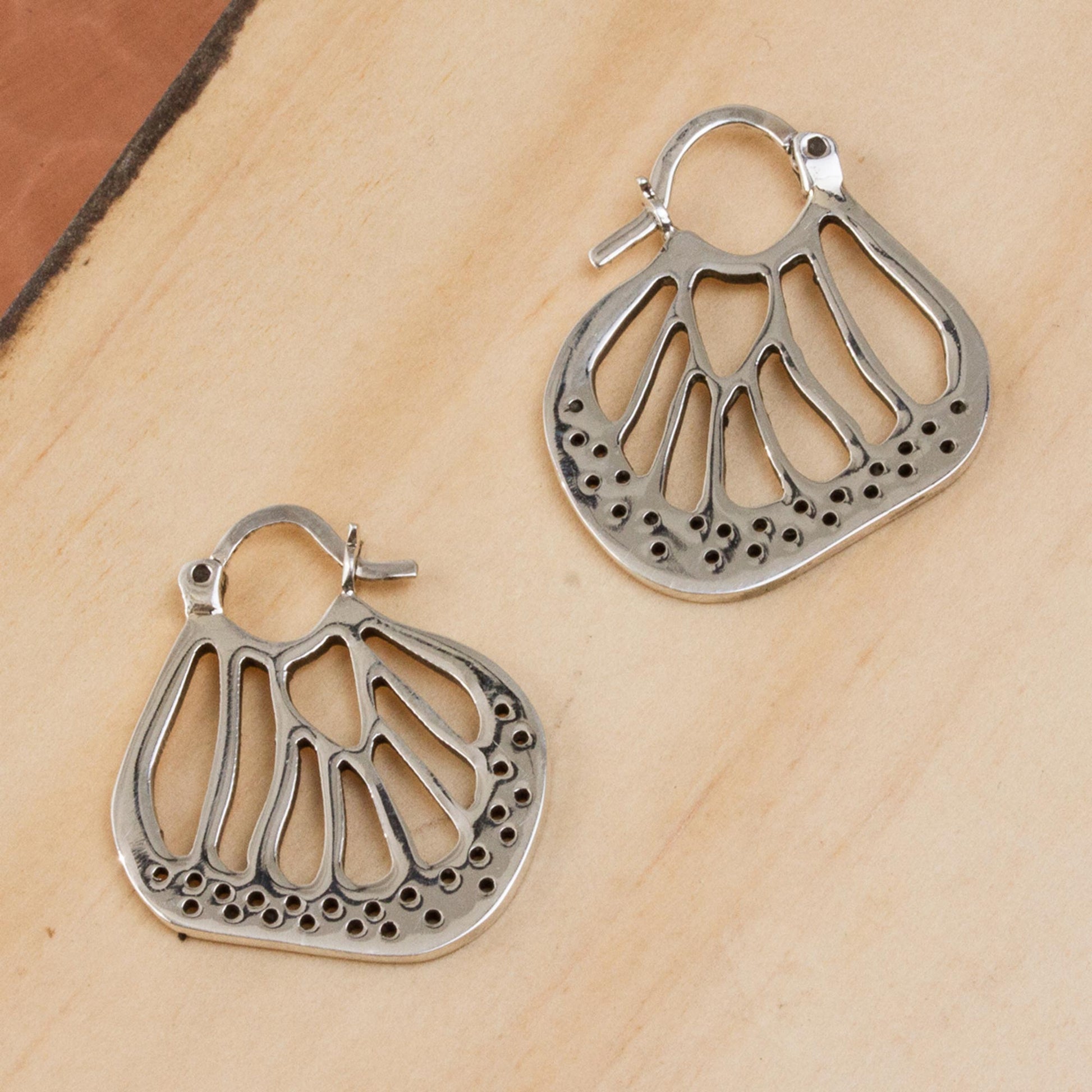 NOVICA Flying Lobes Taxco Sterling Silver Hoop Earrings from