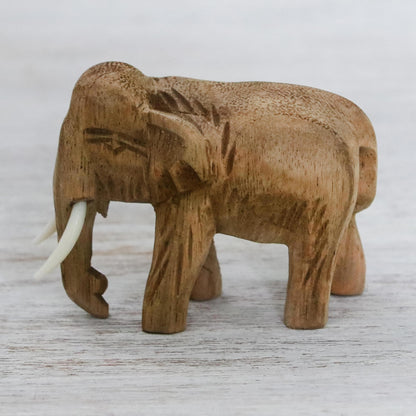 Peaceful Elephant Brown Wood Sculpture