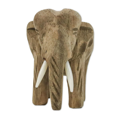 Peaceful Elephant Brown Wood Sculpture