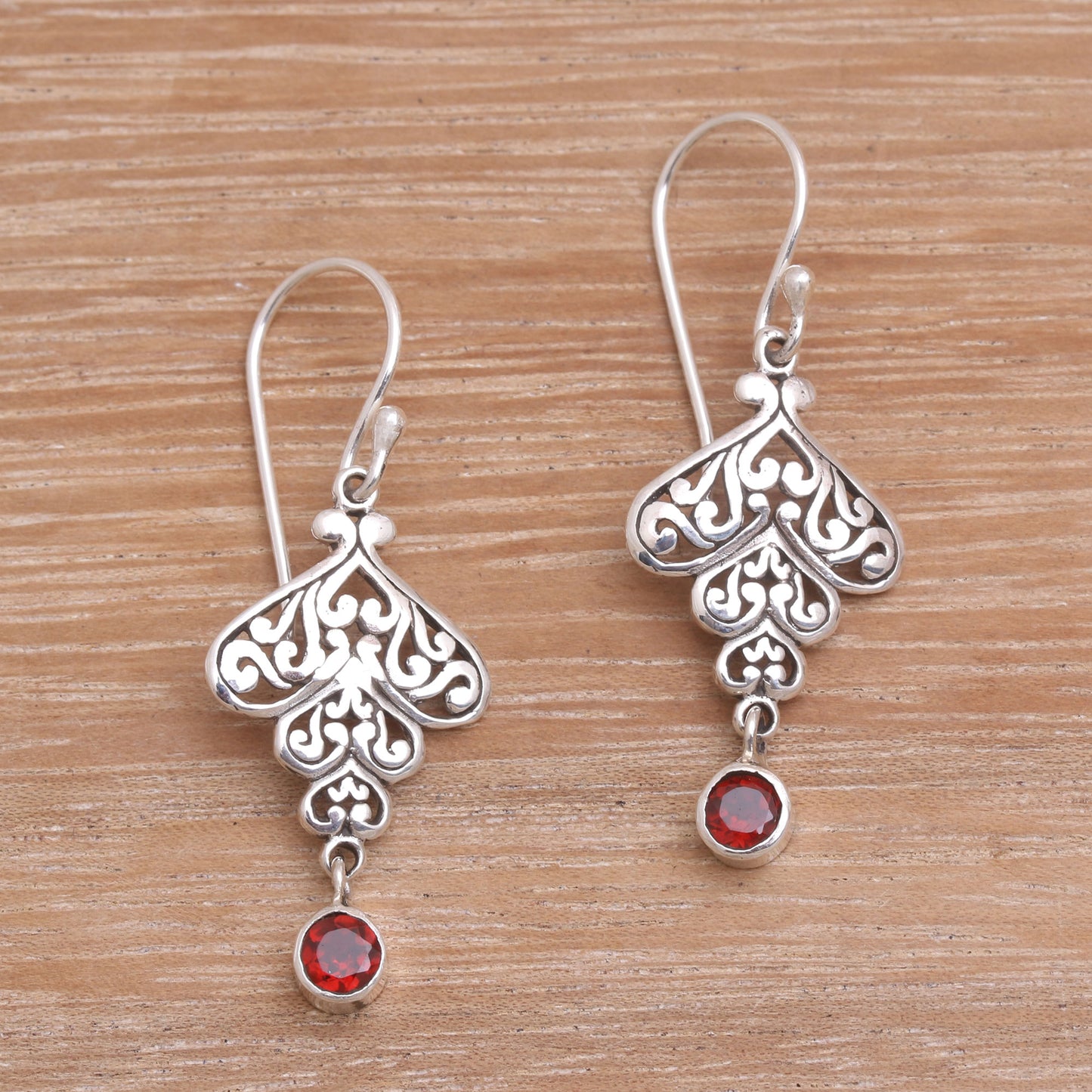 Tumbling Hearts Sterling Silver Tumbling Heart Garnet Dangle Earrings