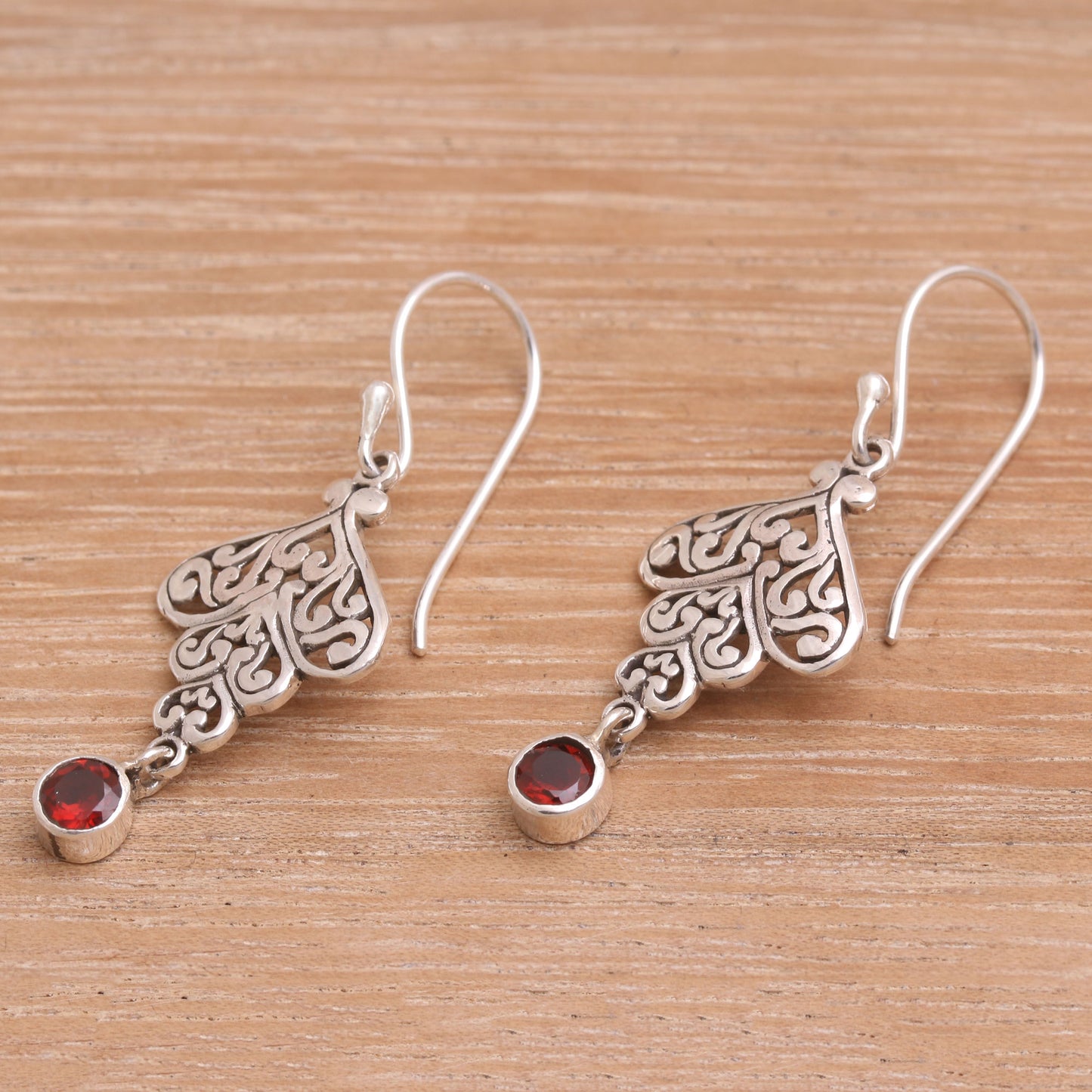 Tumbling Hearts Sterling Silver Tumbling Heart Garnet Dangle Earrings