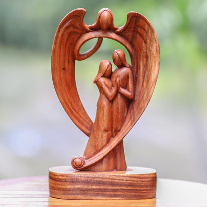 Angelic Presence Hand-Carved Guardian Angel and Couple Suar Wood Sculpture